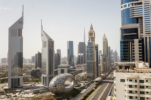 Dubai, UAE – April 16, 2021: Sheikh Zayed Road, top view on  Museum Of The Future, Jumeirah Emirates Towers Hotel, Gevora Hotel, DIFC, Al-Yaqub Tower, Burj Khalifa