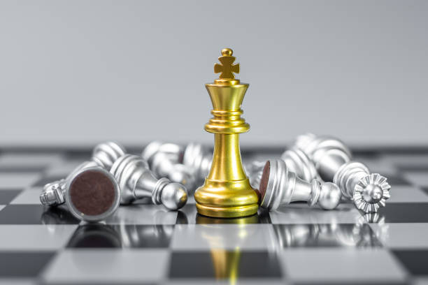 istock Chess king figure stand out from crowd of enemy or opponent during chessboard competition. Strategy, Success, management, business planning, disruption, win and leadership concept 1319462639