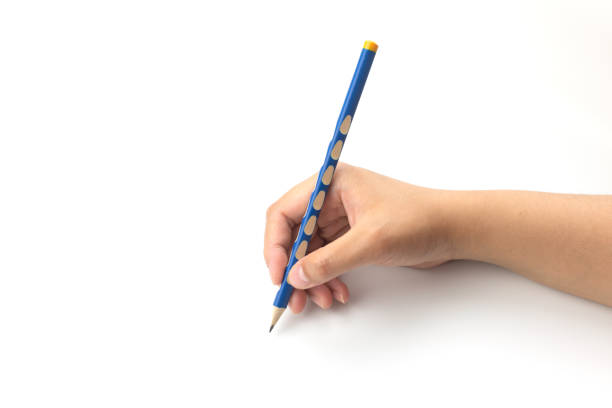 istock Cropped hand holding pencil writing on white paper 1319462964