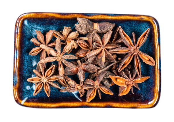 istock star anise (badian) fruit and seeds in bowl cutout 1319464046
