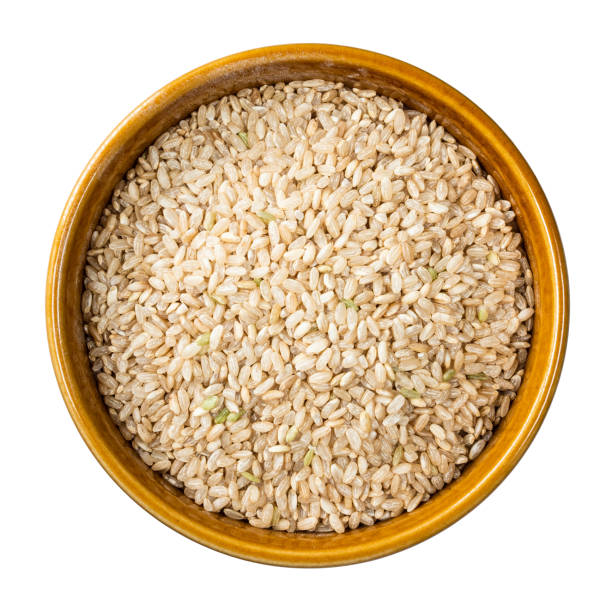 istock partly polished brown rice in round bowl cutout 1319464074