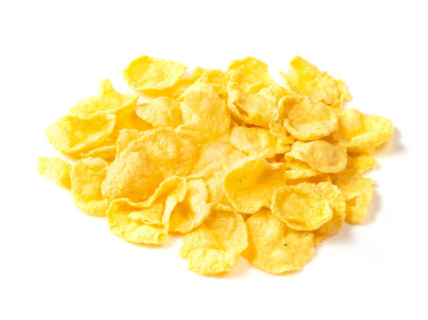 istock handful of sugar-free corn flakes closeup on white 1319465445