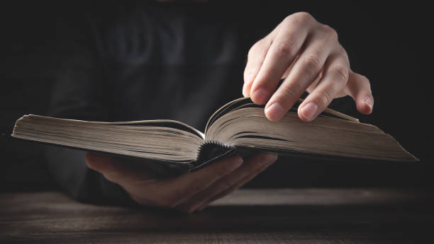 istock Caucasian man holding bible. Religion 1319467787
