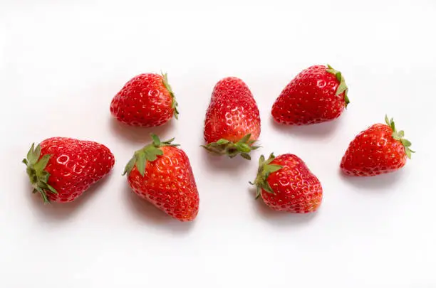 Fresh strawberries isolated on a white background. Directly above.