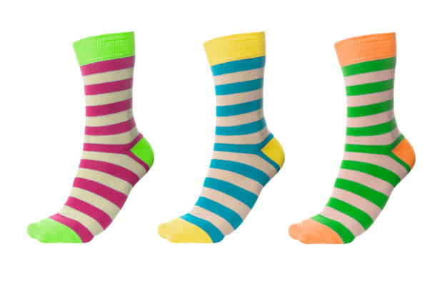 istock Three volumetric socks with different lines isolated on white background. Colorful volumetric socks on white background. Colored socks on the leg isolated on white background 1319469943