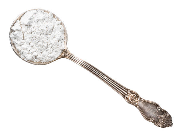 istock vanilla sugar in silver tablespoon cutout 1319470609