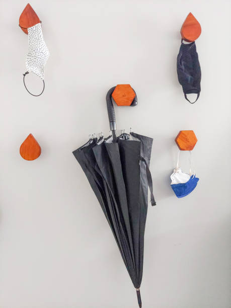 istock Objects hung by wooden supports on the house wall. 1319471086