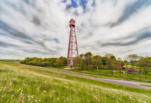 istock Lighthouse in Campen at the North Sea in Germany 1319474570