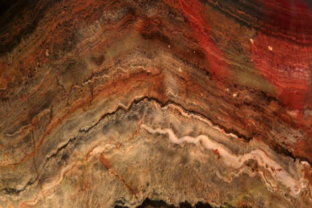 istock Folda Quartsite stone-Colorful texture with stripes, Polished metamorphic Stone Background, abstract stone surface with curved stripes. Foun in Norway mountains 1319475078
