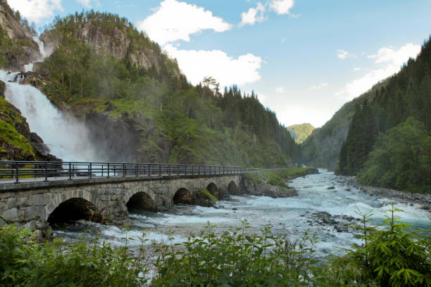 bridge and latefossen or latefoss - one of the biggest waterfalls in norway, scandinavia, europe - bridge norway odda falling imagens e fotografias de stock