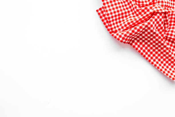 istock Red picnic cloth isolated on white, top view 1319479657