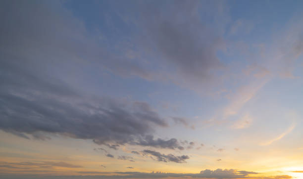 istock Sunset sky. Abstract nature background. Dramatic blue with orange colorful clouds in twilight time. 1319485791