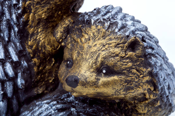istock artificial figure hedgehog portrait of a muzzle concrete product decorative element of landscape design toy close up. 1319491061