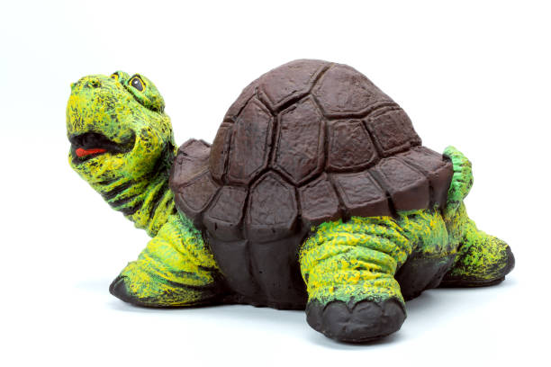 funny artificial turtle garden concrete figure for backyard design decoration or park landscaping, stone animal object cheerful isolated on white background, nobody.
