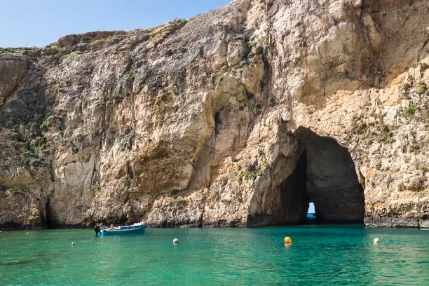 Wonder of Nature - Inland Sea lagoon of seawater on the Gozo island near San Lawrenz, Malta. Inland sea linked with the Mediterranean Sea through the sea cave visible on the photo.
