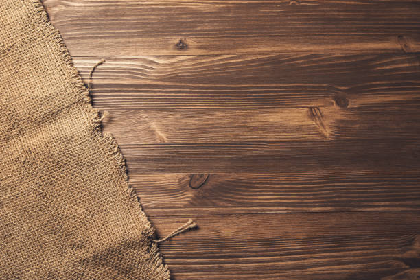 istock canvas on brown wooden background 1319492964