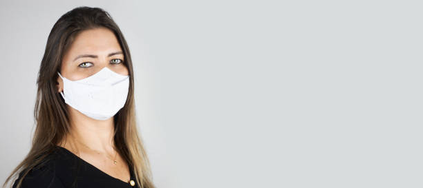 istock beautiful woman with protective mask 1319499135