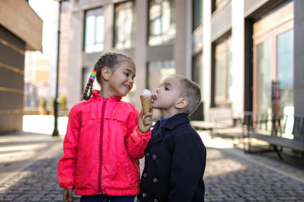 istock Kids eating an ice cream 1319511062