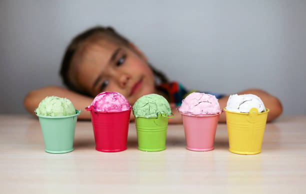 istock Kids eating an ice cream 1319512019