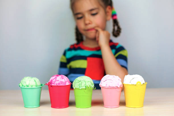 istock Kids eating an ice cream 1319512022
