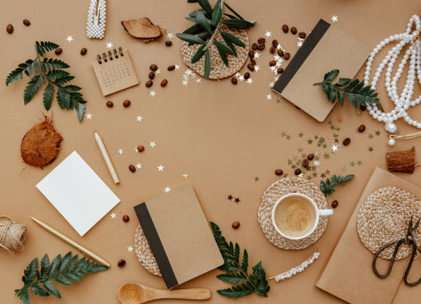 istock Stylish background with cup of coffee, calendar and notes on brown . Ideas, notes or plan writing concept. Minimal eco friendly blogger. Zero waste 1319513054