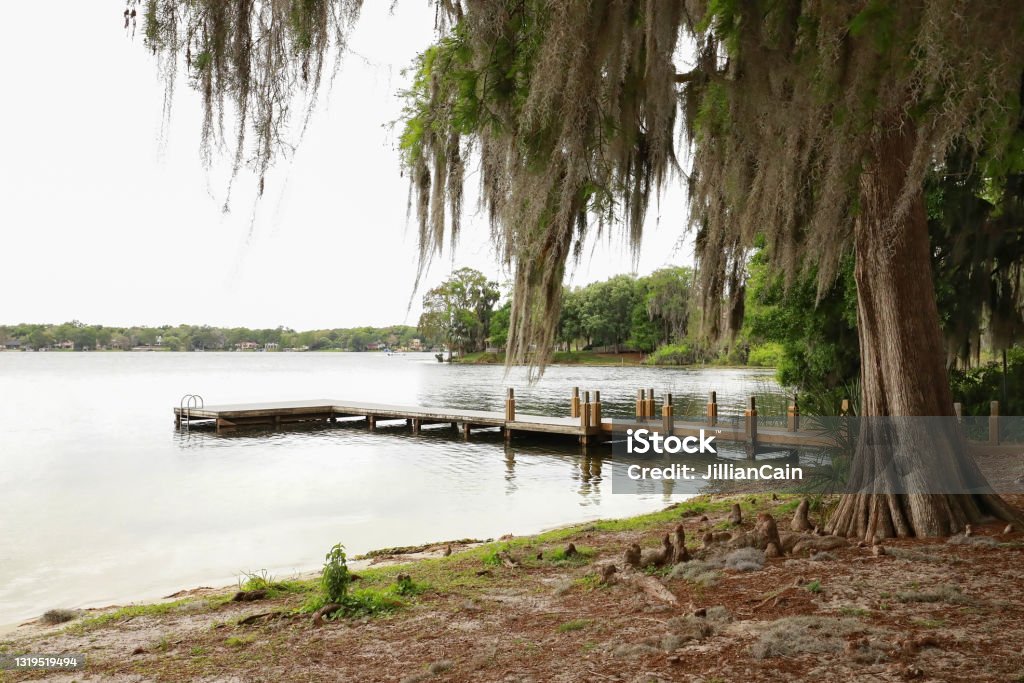 Small dock in Winter Park, Florida Dinky Dock Park  a one and half acre year-round park offering a fishing pier and boat ramp in Winter Park, Florida, USA. Florida - US State Stock Photo