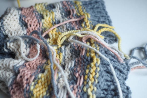 istock Weaving on the ends of a knitting project 1319520282