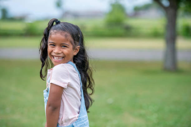 istock Young smiling girl 1319525228