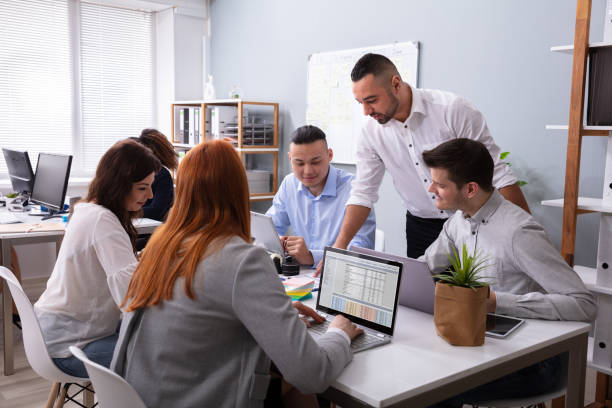 istock Businesspeople Discussing Together During Meeting At Office 1319546898