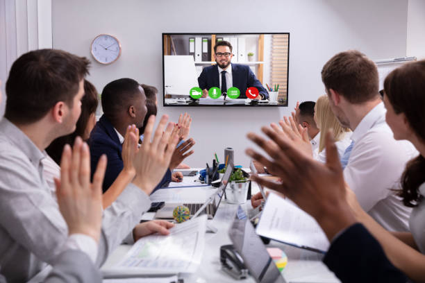 istock Businesspeople Having Video Conference In Boardroom 1319546939