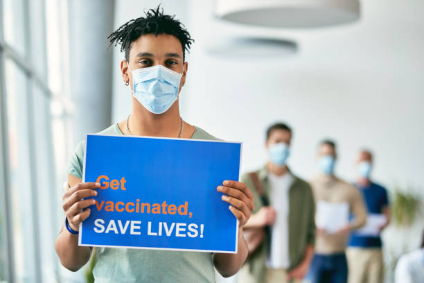 istock Young African American man supporting vaccination against coronavirus. 1319550965