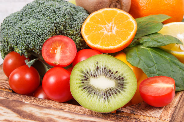 istock Fruits and vegetables as source minerals and vitamins. Diet, slimming and healthy nutrition concept 1319552674