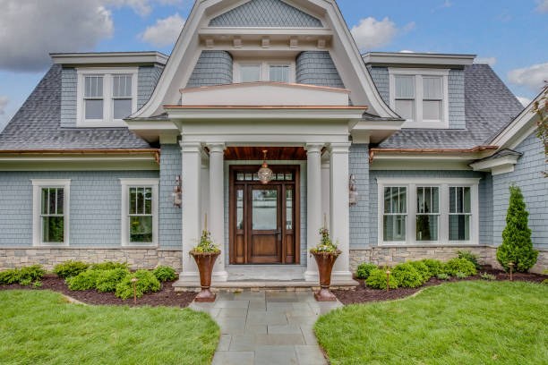 istock Lovely front porch with perfect landscaping 1319557561