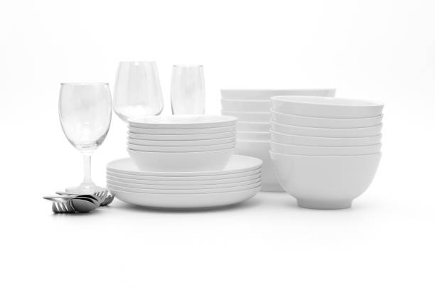 istock set clean dishes glasses on white background 1319564274