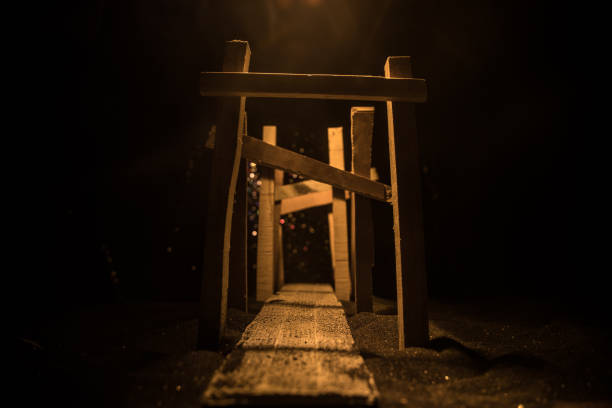 istock Creative artwork decoration. Abstract Japanese style wooden tunnel at night. Selective focus 1319564700