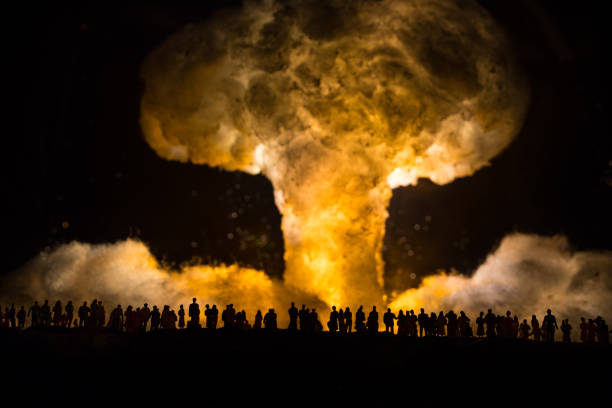 istock Nuclear war concept. Explosion of nuclear bomb. Creative artwork decoration in dark. 1319564742