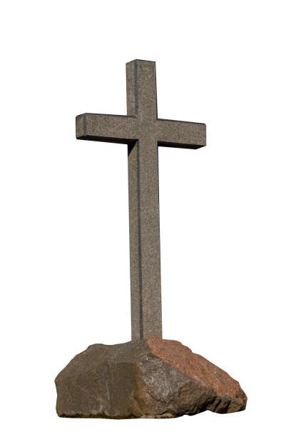 istock stone cross on a stone isolated on a white background. religious concept 1319565807