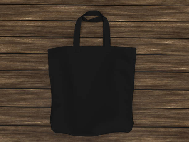 istock Blank tote bag mock up on wood background 1319570292