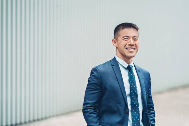 istock Smiling middle aged businessman 1319571136