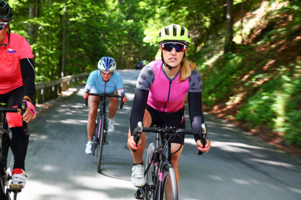 istock Female friends cycling 1319571267