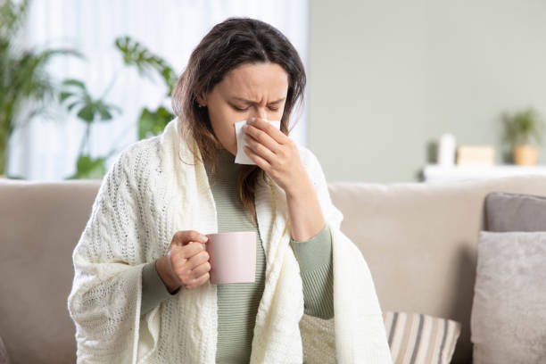 istock Young woman suffering from cold 1319578044