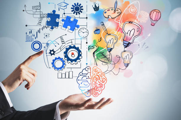 istock Man hand touch brain sketch with two different sides of thinking 1319578468