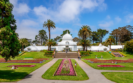 San Francisco, CA / USA - July 16 2015: View of the Conservatory of Flowers, a greenhouse and botanical garden that houses a collection of rare and exotic plants, in Golden Gate Park.