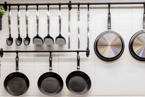 istock Close-up of kitchen utensils hanging on hooks 1319580854