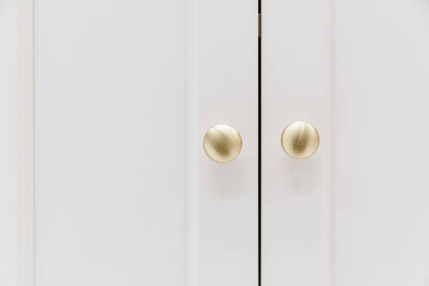 istock Simple, comfortable and clean white wardrobe door 1319580906