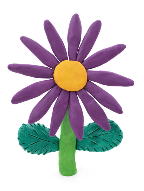 istock One plasticine flower with purple petal. 1319581975