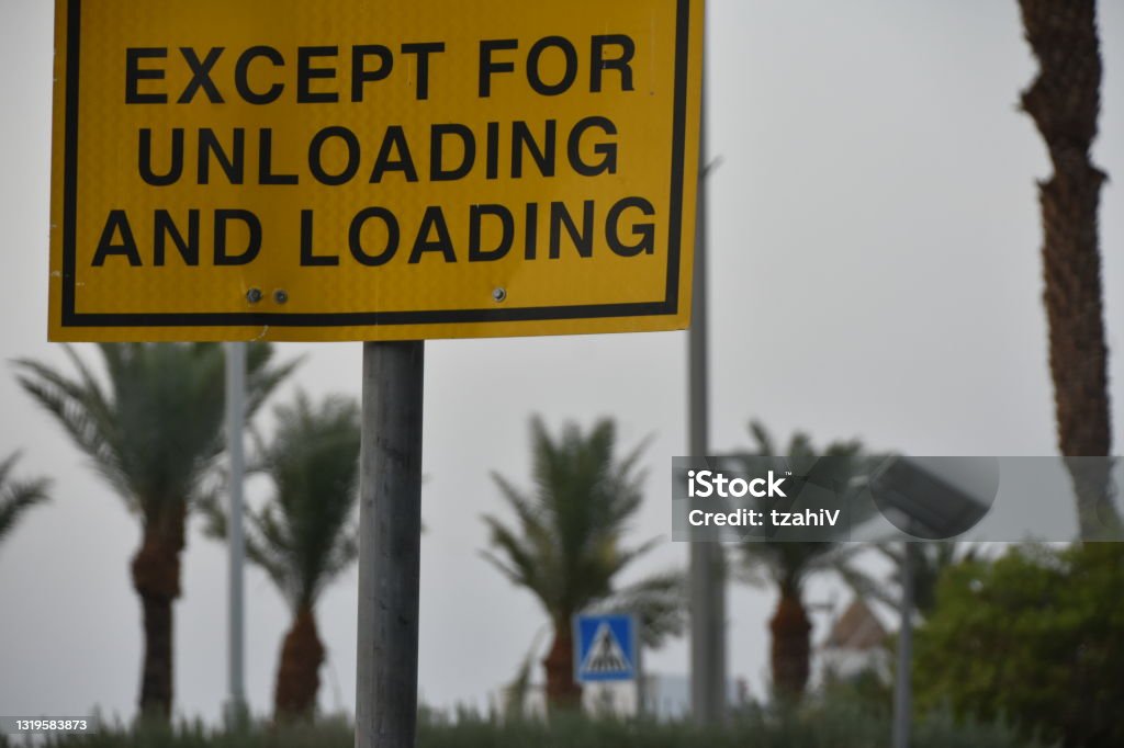 Loading And Unloading Sign Stock Photo - Download Image Now - Color ...