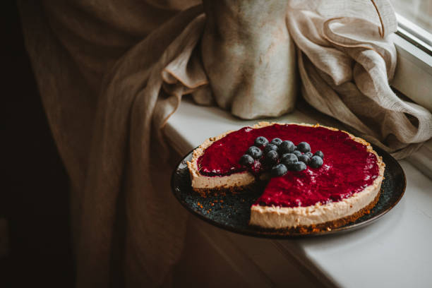 Homemade, Raw Vegan Blueberry Cheesecake Homemade, Raw Vegan Blueberry Cheesecake deli pie stock pictures, royalty-free photos & images