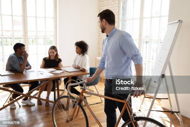 Creative Diverse Colleagues Enjoying Worktime In Modern Office Stock Photo - Download Image Now