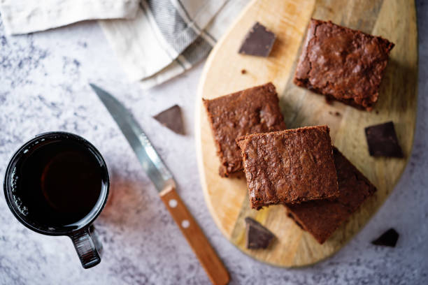 istock Chocolate brownie with chocolate drops 1319587451